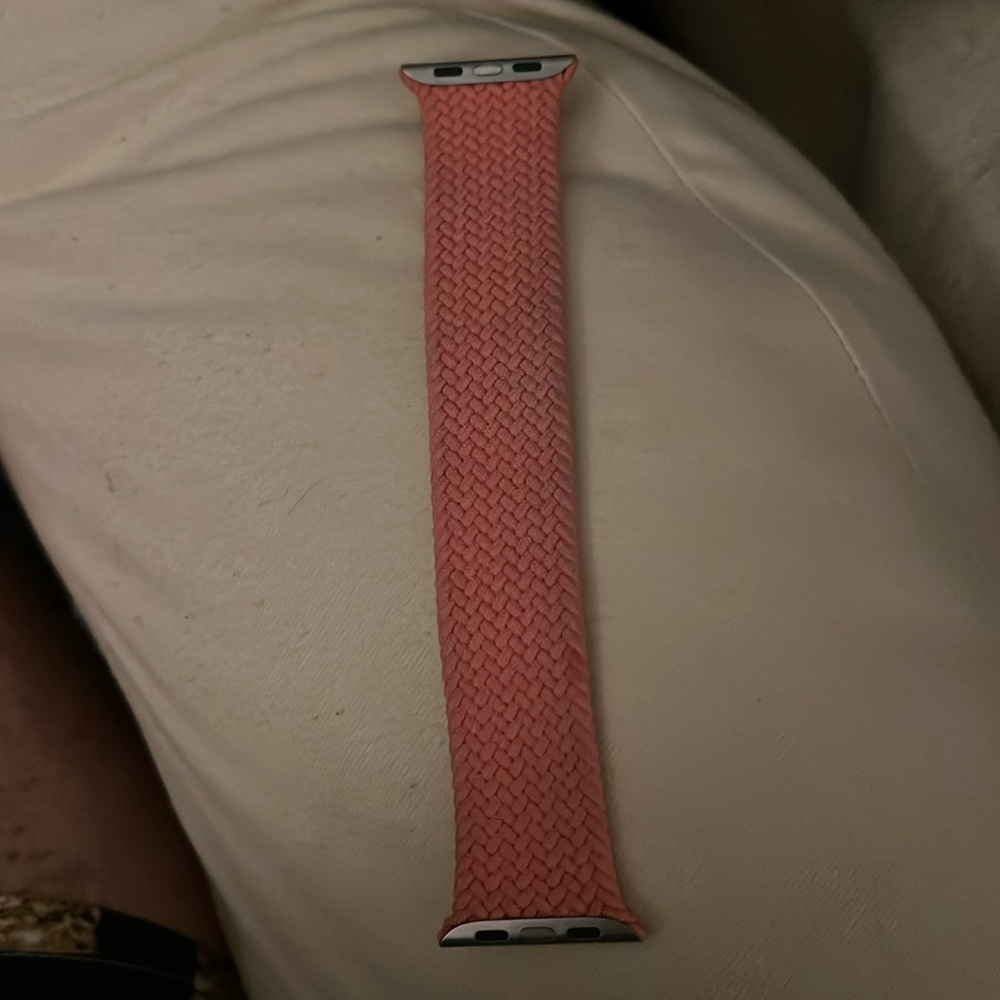 Apple size 42. Braided band stretches but hold shape well.